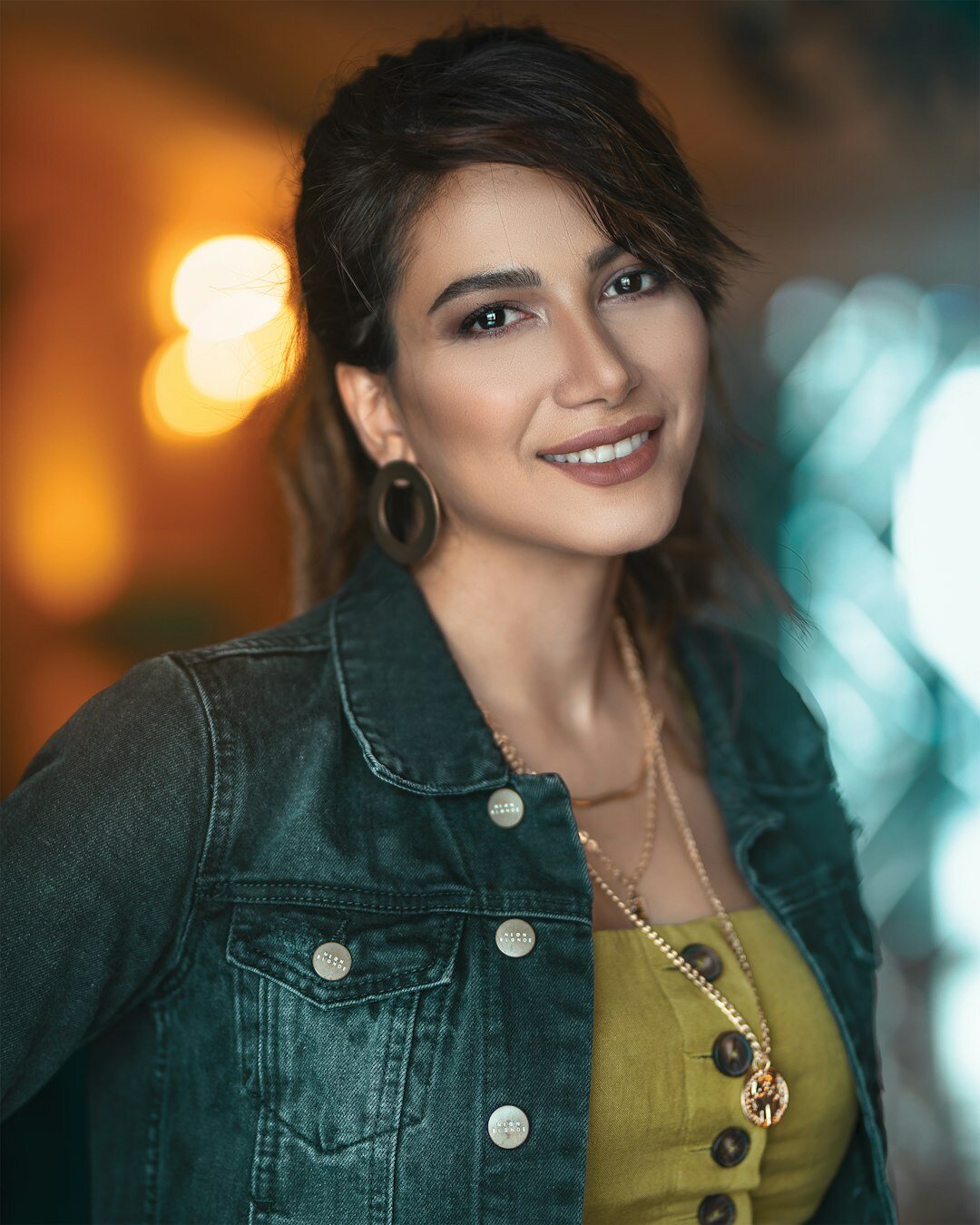 Turkish television news anchor portrait smiling